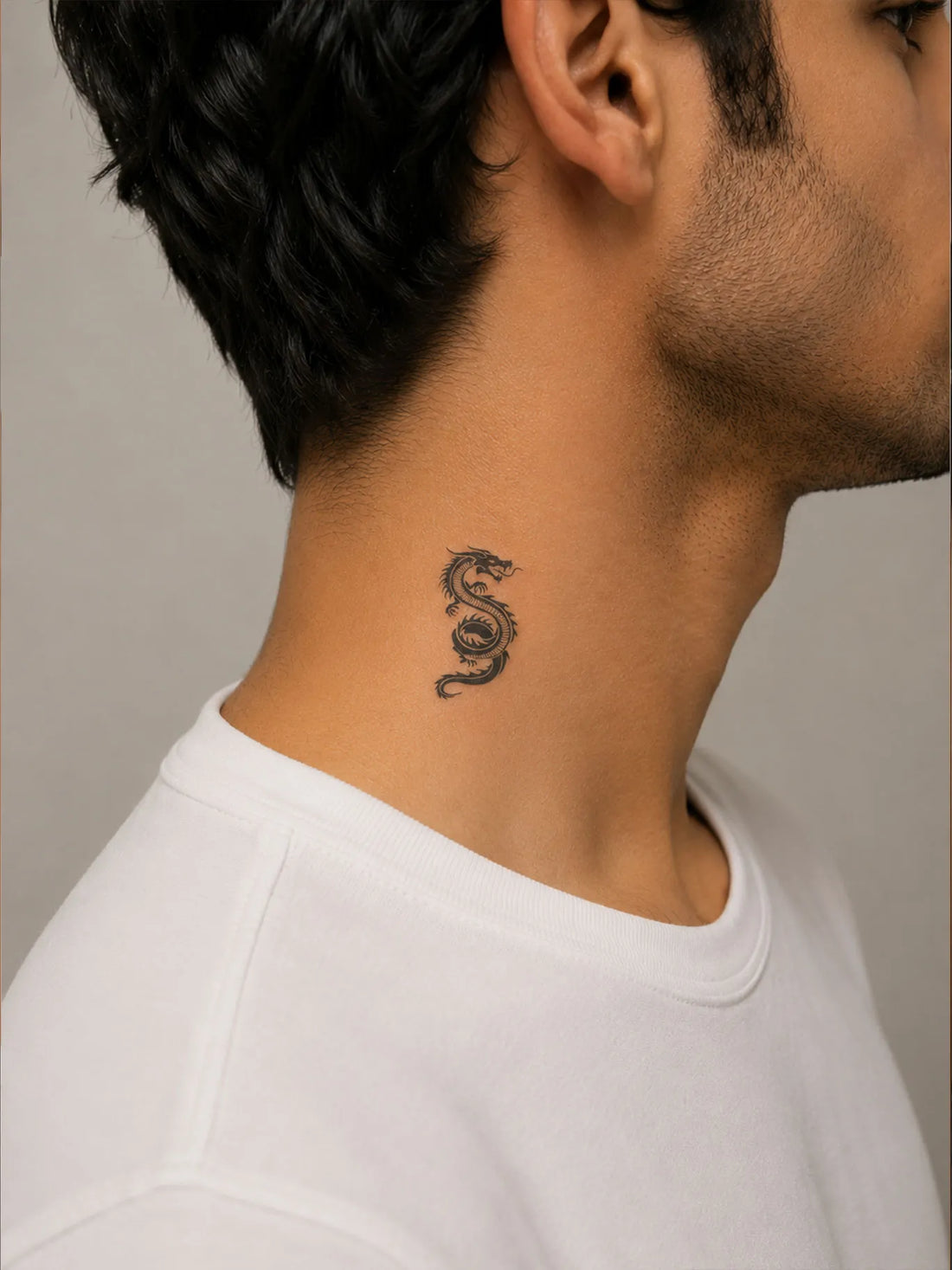 Stylish black dragon temporary tattoo on wrist, waterproof & easy to apply for trendy body art