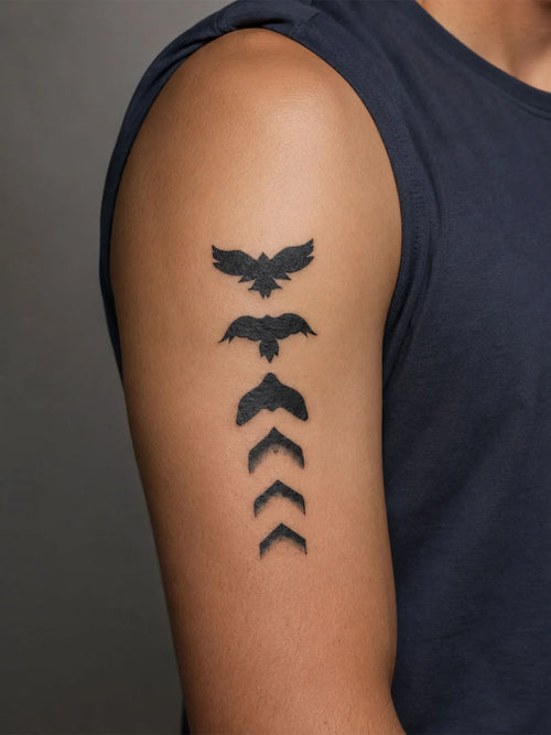 Wing Silhouettes Tattoo