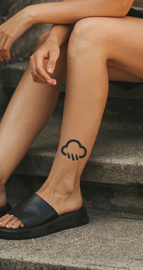 Rain cloud temporary tattoo on ankle, stylish waterproof design for trendy self-expression